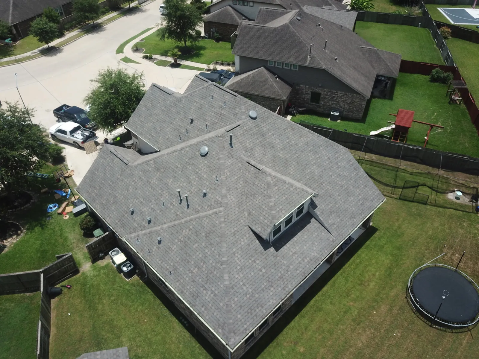 A completed Now Roofing roof replacement on a home in the Greater Houston area