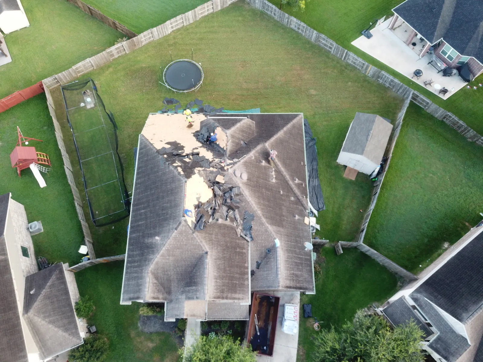 Storm damage documented on a Baytown roof during a Now Roofing insurance inspection
